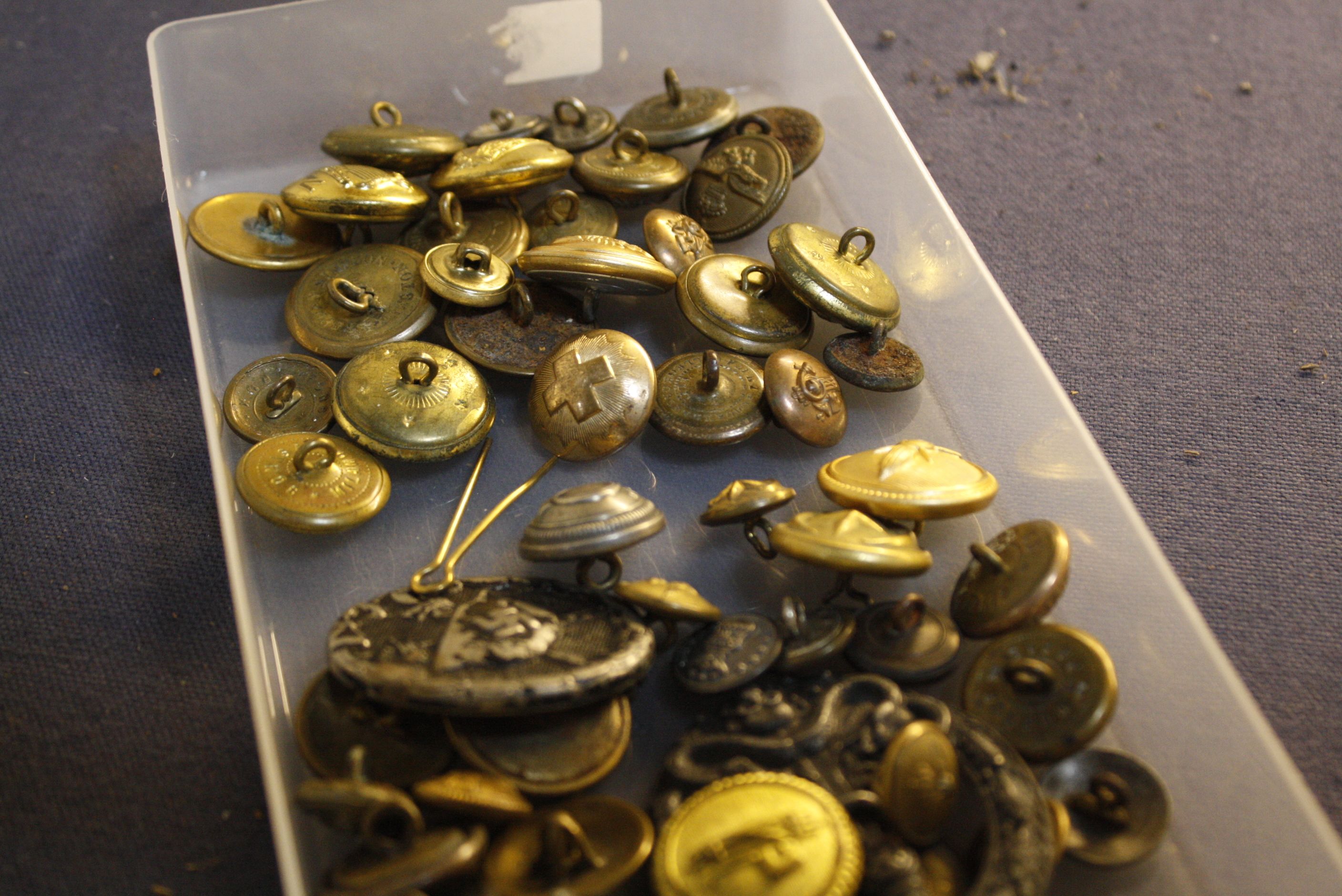 [Militaria] - A Collection of Military Buttons and Insignia, including a wound and an anti-