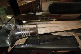 Eight Middle Eastern or Indian swords, a dagger, three spear heads, a European sabre, and a