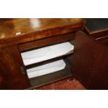 A 19th Century Dutch mahogany cabinet, with inlaid shell decoration, with hinged lid and cupboard