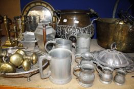 A quantity of assorted metalware to include door handles, brass candlesticks, pewter etc Best Bid