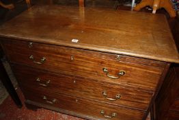 A mahogany chest with brushing slide, three long drawers on bracket feet, formally lower part of a