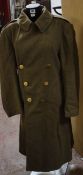 [Militaria] - A Second World War U. S. Army Field Overcoat, of heavy wool construction with built-in