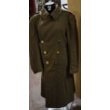 [Militaria] - A Second World War U. S. Army Field Overcoat, of heavy wool construction with built-in