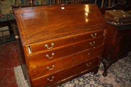 An Edwardian mahogany fall front bureau with three graduated drawers 117cm wide Best Bid