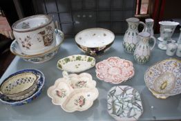 A quantity of decorative ceramics, to include blue and white jugs, graduated jugs, bowls, vases
