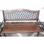 A cast iron and slatted garden bench