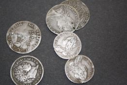 Two Elizabeth I sixpence dated 1562 and 1592, bust of Elizabeth and longcross behind; Two George