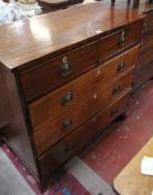 An early 19th century mahogany chest with two short and three long drawers on splayed feet 112cm