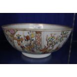 An 18th Century Chinese bowl, decorated with figures, 28.5cm in diameter (af)