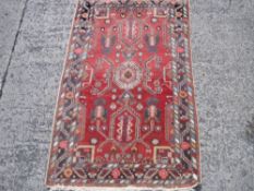 A Persian Brojerd rug 152 x 94cm Best Bid