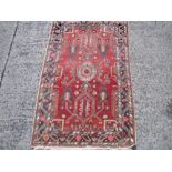 A Persian Brojerd rug 152 x 94cm Best Bid