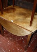 A George III mahogany pembroke table, the moulded oval twin flap top above frieze drawer and