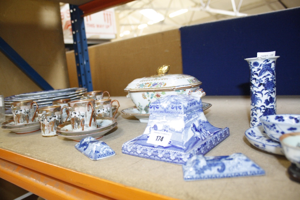 A selection of mostly blue and white printed pottery to include a pair of knife rests, a Japanese