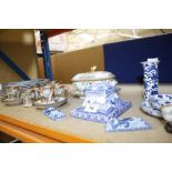 A selection of mostly blue and white printed pottery to include a pair of knife rests, a Japanese