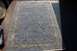 A Middle Eastern rug 159 x 186cm, a Chinese rug and a further Persian style rug -3 Best Bid