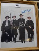 Three Western signed photos; Eli Wallach (Magnificent Seven) framed / mounted black and white photo,