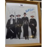 Three Western signed photos; Eli Wallach (Magnificent Seven) framed / mounted black and white photo,