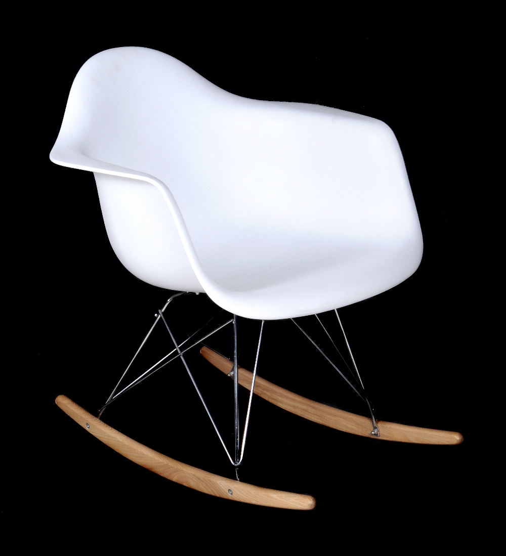 After Charles and Ray Eames, an RAR style rocking armchair, originally designed in 1950, in