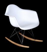 After Charles and Ray Eames, an RAR style rocking armchair, originally designed in 1950, in