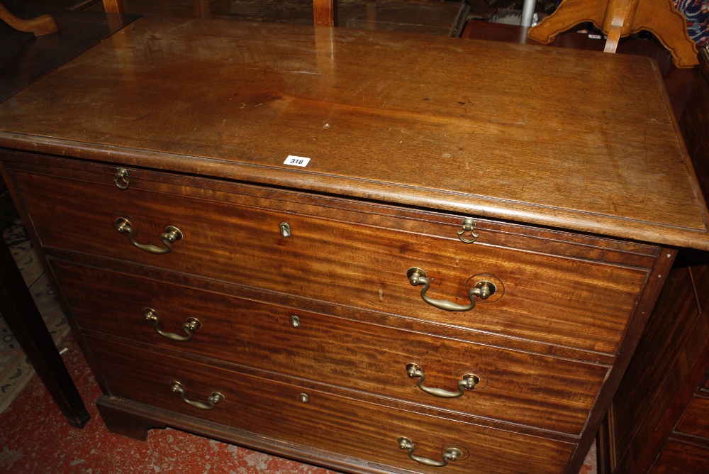 A mahogany chest with brushing slide, three long drawers on bracket feet, formally lower part of a