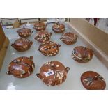 Ten Mexican terracotta lidded pots (one extra lid)