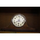 Two oak cased mantel clocks and a walnut cased Art Deco design mantel clock. (all working and