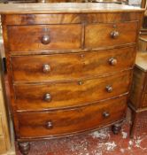 A 19th Century bowfront chest of two short and three long drawers on turned feet 107cm wide