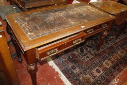 A Victorian mahogany writing desk, with an inset writing surface, both drawers bearing stamp J.A