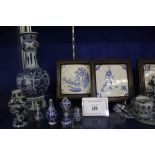 A selection of 19th and 20th Century Dutch Delft to include four 18th Century Delft tiles, miniature