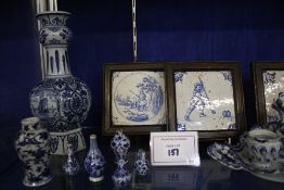 A selection of 19th and 20th Century Dutch Delft to include four 18th Century Delft tiles, miniature