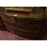 A George III mahogany low bowfronted chest with two short and two long drawers, on bracket feet, (