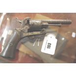 A small late 19th Century 9mm Lefaucheux pin fire revolver with six chambers faint makers stamp to