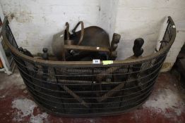 An Edwardian brass firescreen, fire grate and two pairs of cast iron andirons Best Bid