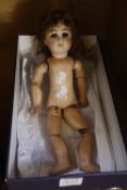 A Tete Jumeau bisque head doll, painted features, jointed body (af)