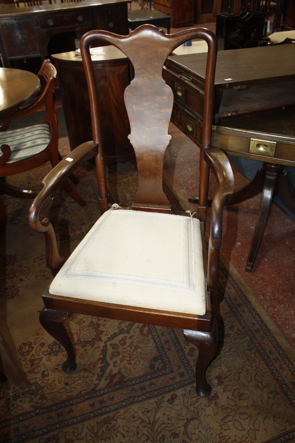 Eight Queen Anne style mahogany dining chairs each with vase splat to include two armchairs