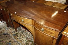 A 19th century mahogany and marquetry triple bowfront sideboard or serving table 152cm wide
