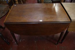 An early 19th Century mahogany and crossbanded pembroke table