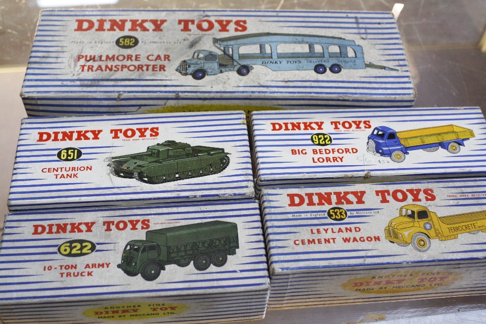 Five boxed Dinky diecast vehicles, including the 582 Pullmore Car Transporter, the 533 Leyland