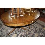 A mahogany oval twin pillar dining table, 20th Century 185cm extended Best Bid