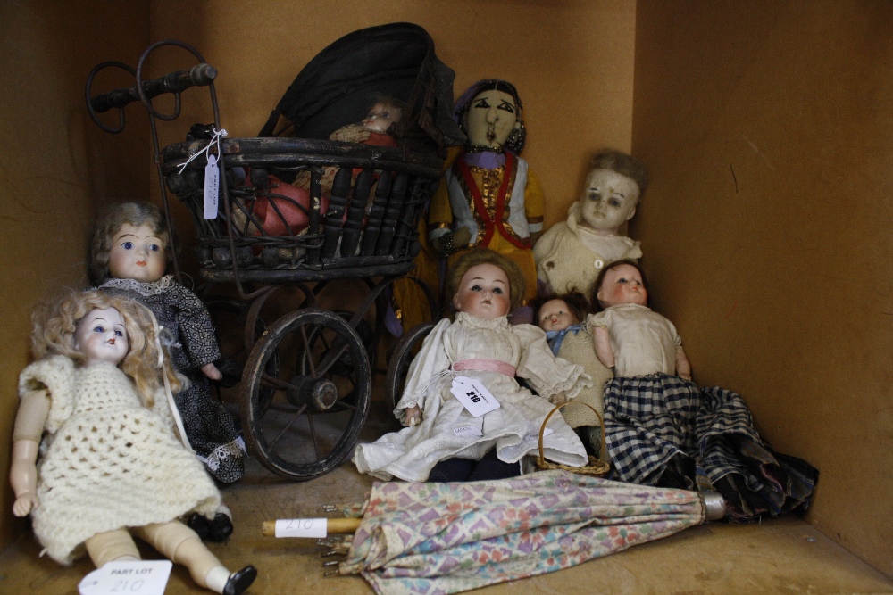 A small collection of early 20th Century English and Continental dolls, a doll's pram, a parasol, an - Image 2 of 2