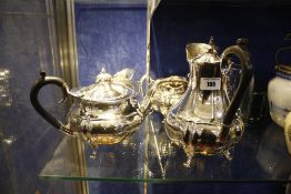 A Walker & Hall plated four piece tea set, a Dutch lidded canister, a Shakespeare jug, a glass
