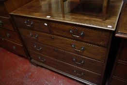 An Edwardian mahogany chest, the rectangular moulded top above two short and three boxwood lined