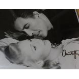 A signed framed photo of Christopher Lee together with a signed photo of Donald Sutherland. (