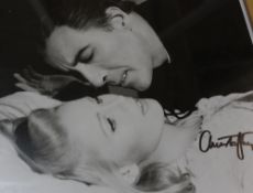A signed framed photo of Christopher Lee together with a signed photo of Donald Sutherland. (
