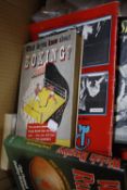 Sporting Memorabilia: A small collection of sports related books and a selection of boxing magazines