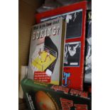 Sporting Memorabilia: A small collection of sports related books and a selection of boxing magazines