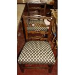 A pair of mahogany ladder back side chairs in George III style & a painted demi-lune side table in