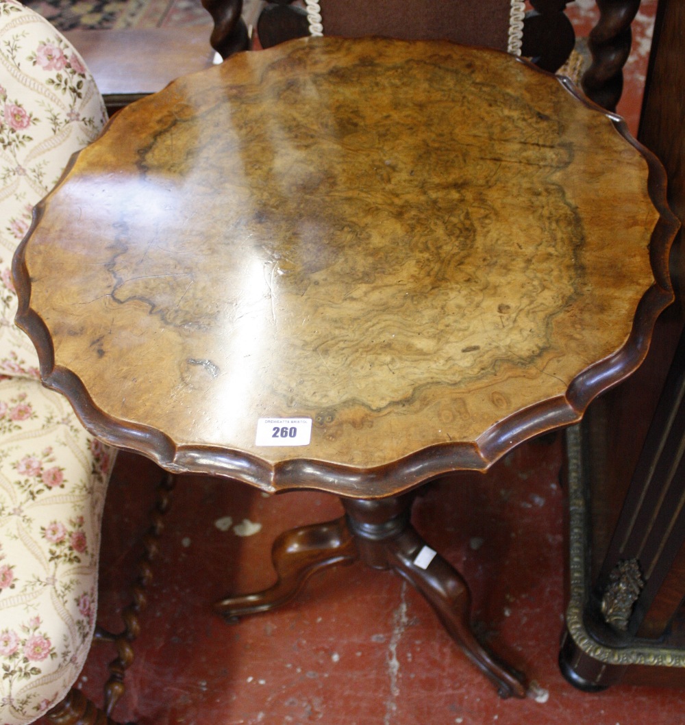 A wall shelf with a low Victorian nursery chair with barley turned legs and a small walnut table