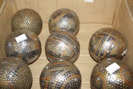 Eight early 20th Century petanque balls