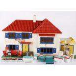 A 1960s Triang "Avon" dolls house and contents. Comprising the Spot-on/Jenny's Home range of
